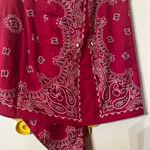 Red bandanna wrap style cover-up or skirt ties in front comes to a draping point - Picture 5 of 7